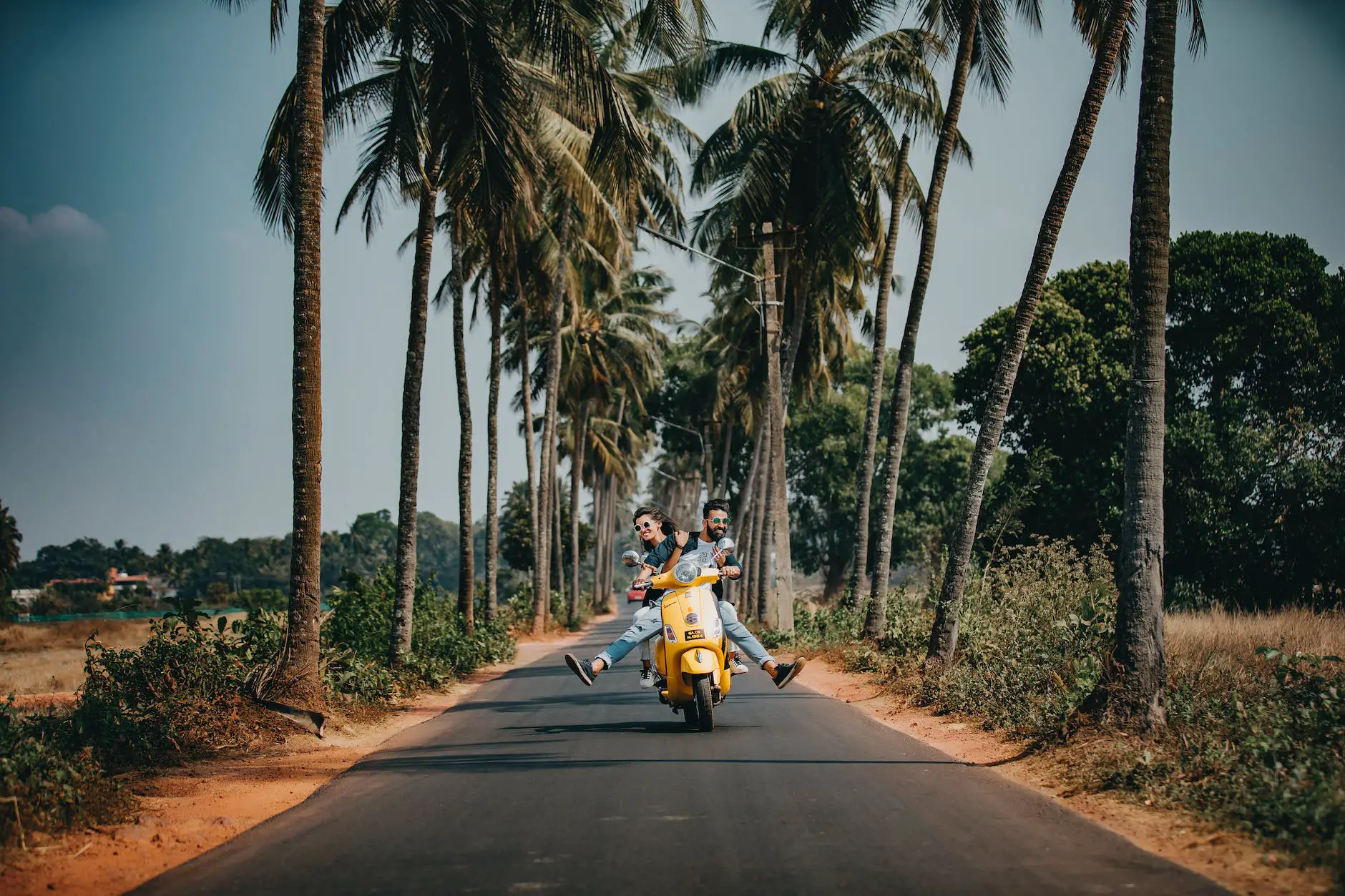 woman and man riding on motorcycle